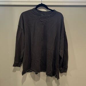 Distressed, oversized sweater